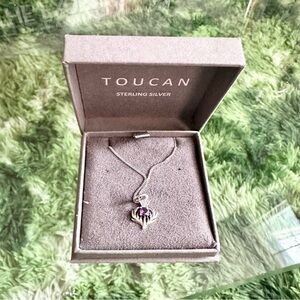 Toucan sterling silver heart necklace
